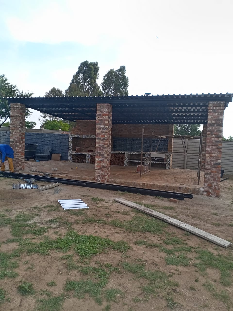 Brick lapa with steel roof structure in progress